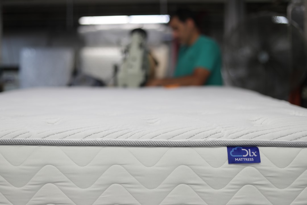 Tape edging in a mattress factory.